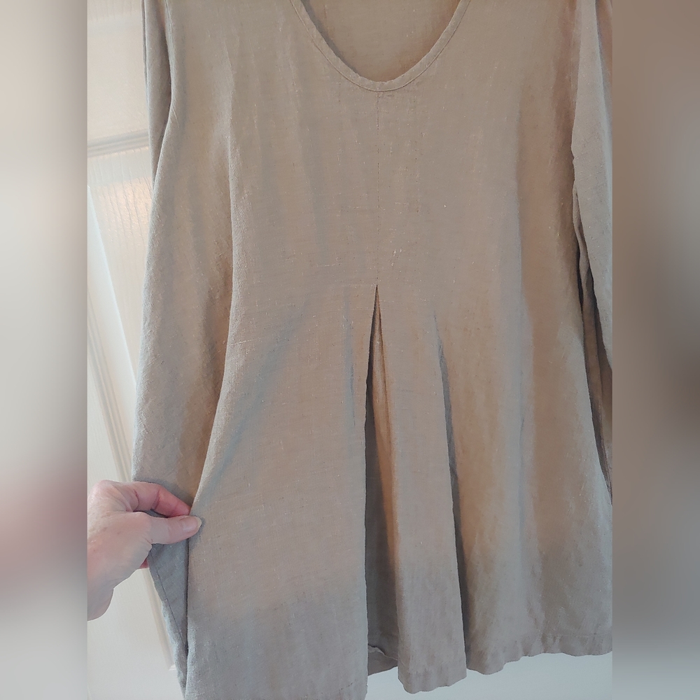 Long-sleeved women's casual top. Very flowy and loose-fitting.